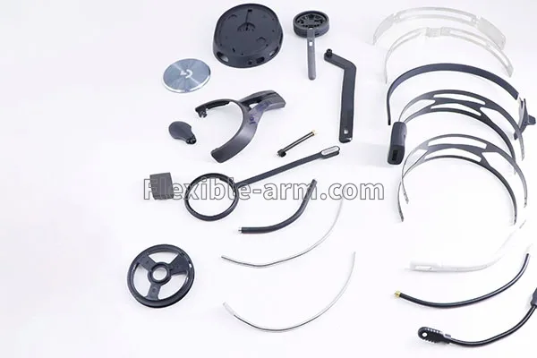 Flexible boom arm for headset microphone assemblies